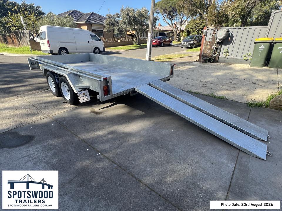 Rear right view of 12x6 dual axle galvanised trailer with heavy duty loading ramps