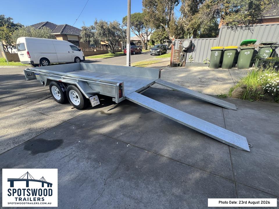 12x6 dual axle galvanised flat-top trailer for hire in Spotswood Melbourne with twin loading ramps deployed