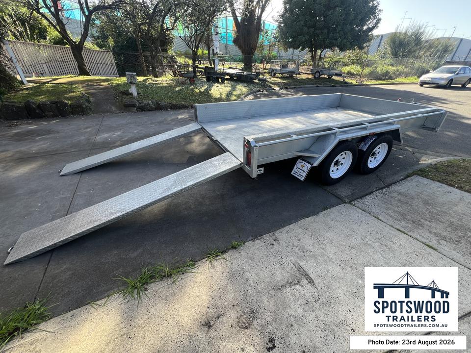 12x6 dual axle trailer with twin checkerplate loading ramps viewed from the rear left