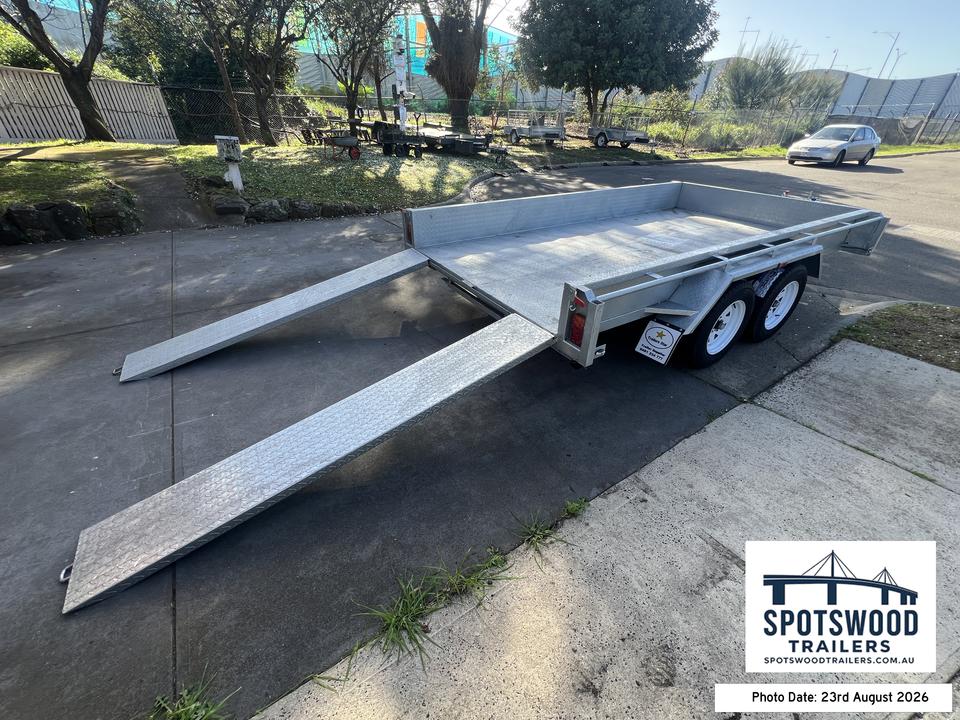 Galvanised 12x6 flat-top trailer for hire in Spotswood with loading ramps deployed