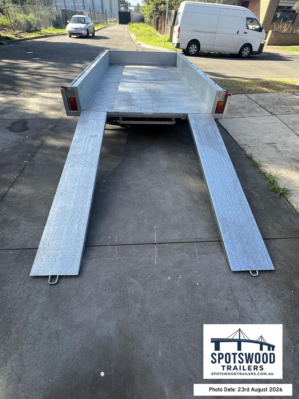 Straight rear view of The Deckhand trailer with twin loading ramps positioned on the rear deck