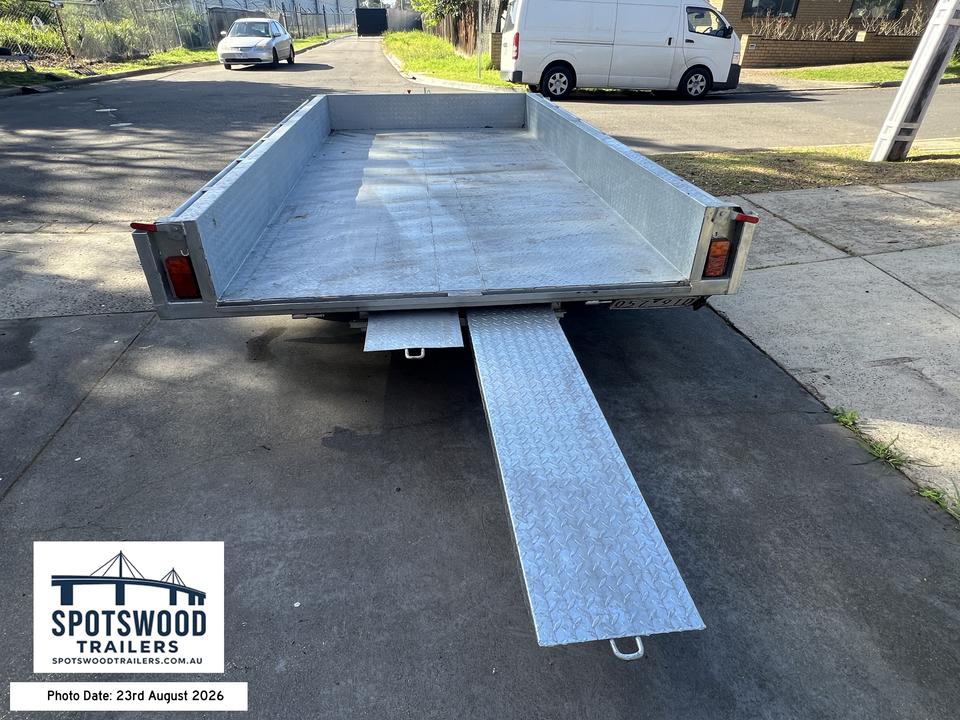 12x6 trailer rear view with one checkerplate loading ramp deployed